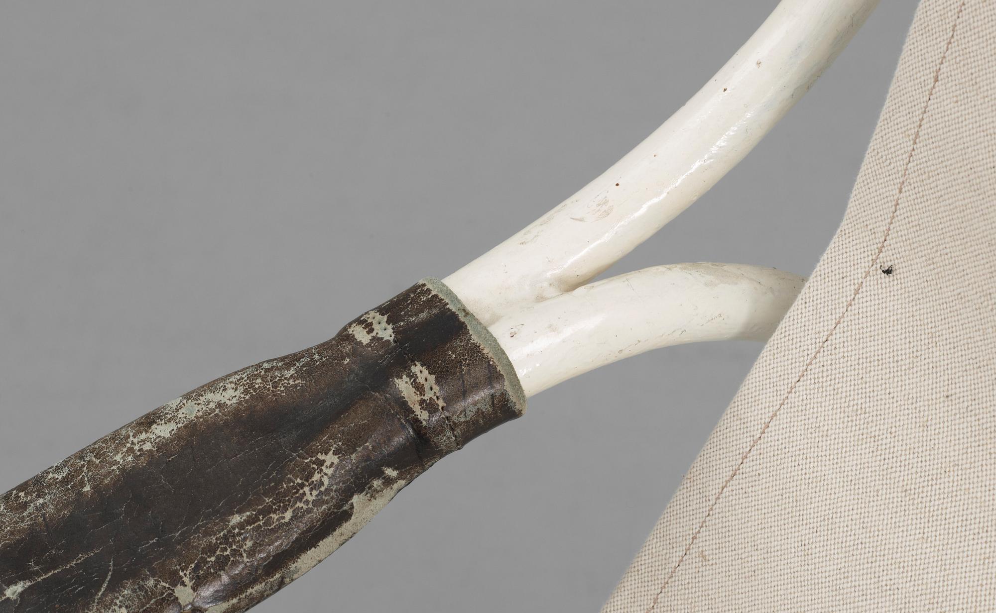 A Gustaf Isak Claesson lacquered metall and canvas easy chair, ca 1930.