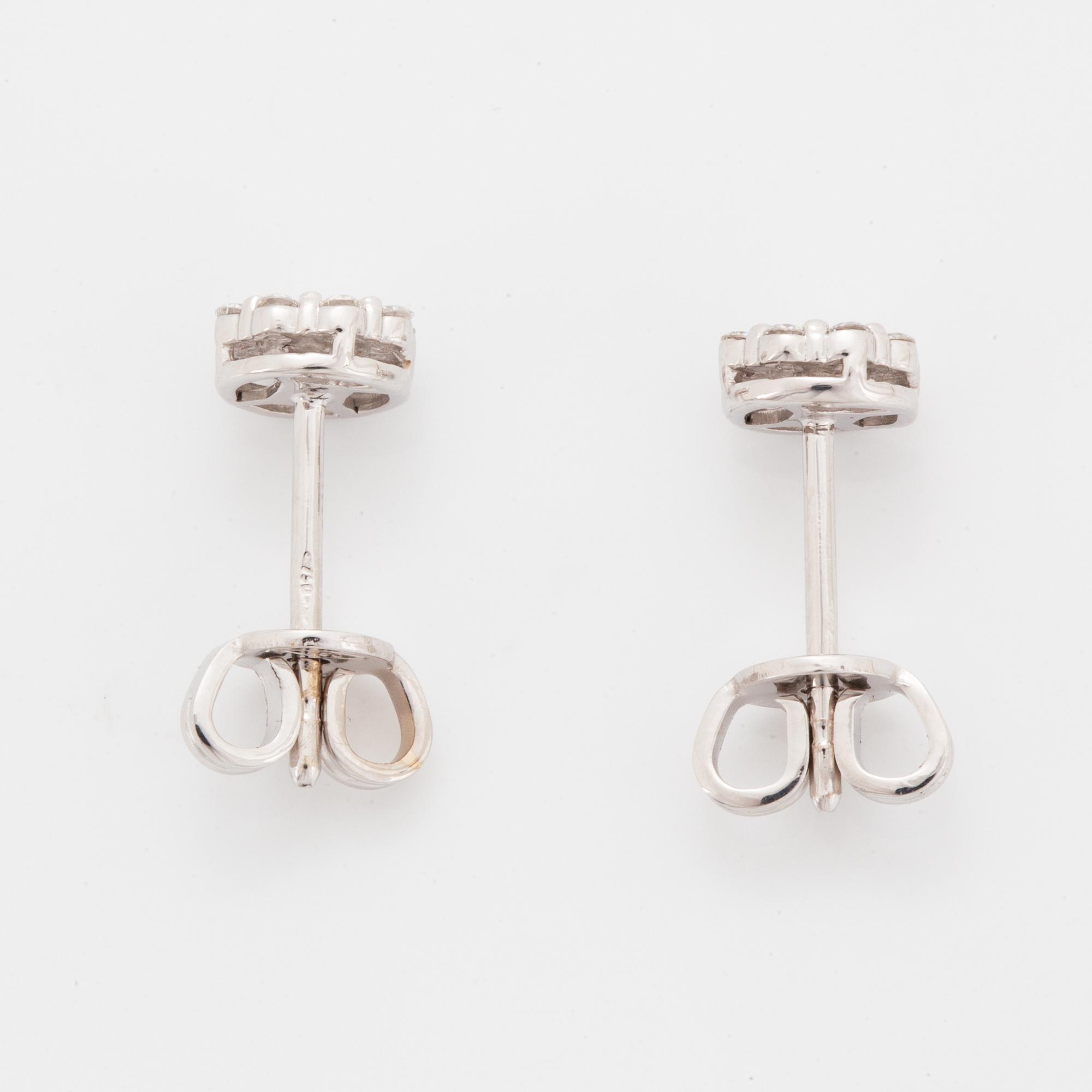 Brilliant-cut diamond earrings.