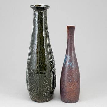 GUNNAR NYLUND, two stoneware jugs, one named "Farina", second half of the 20th century.