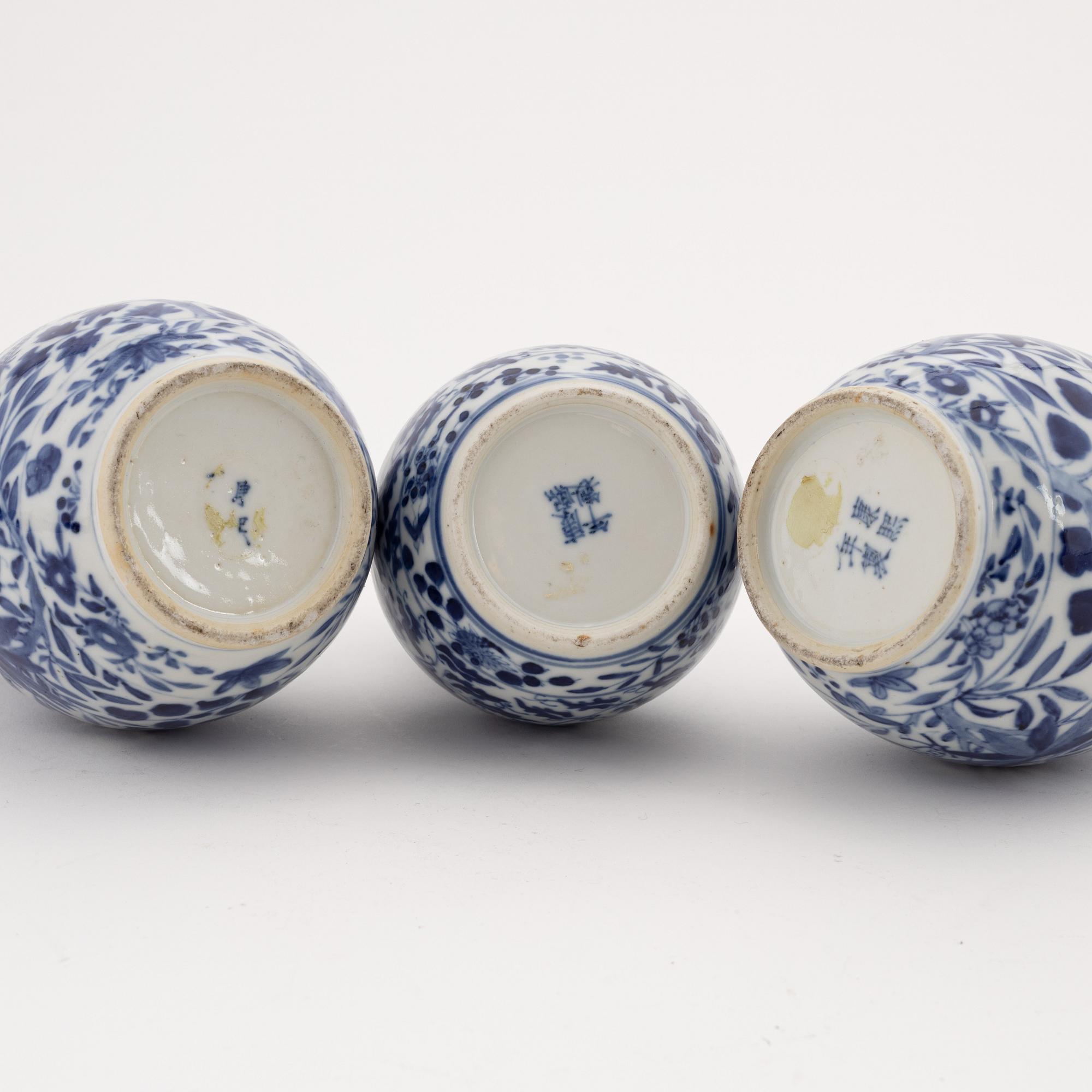 A set of three blue and white vases, Qing dynasty, 19th century.