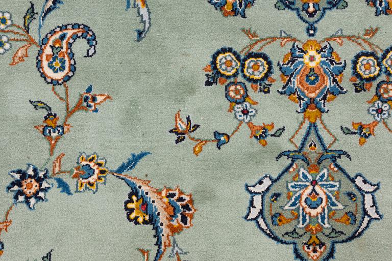 A Keshan carpet, signed, c. 376 x 270 cm.