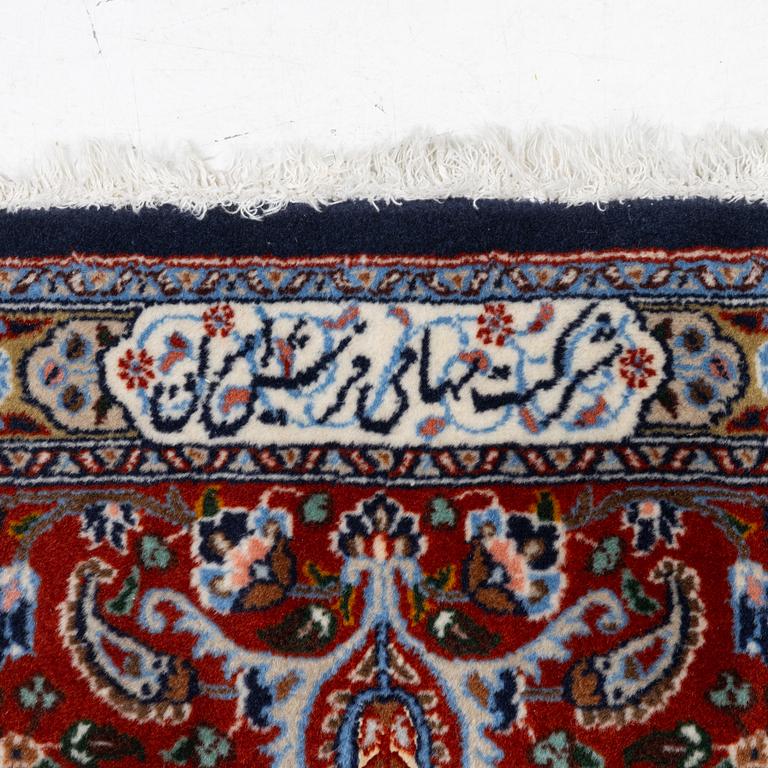A Moud carpet, part silk, signed, c. 345 x 249 cm.