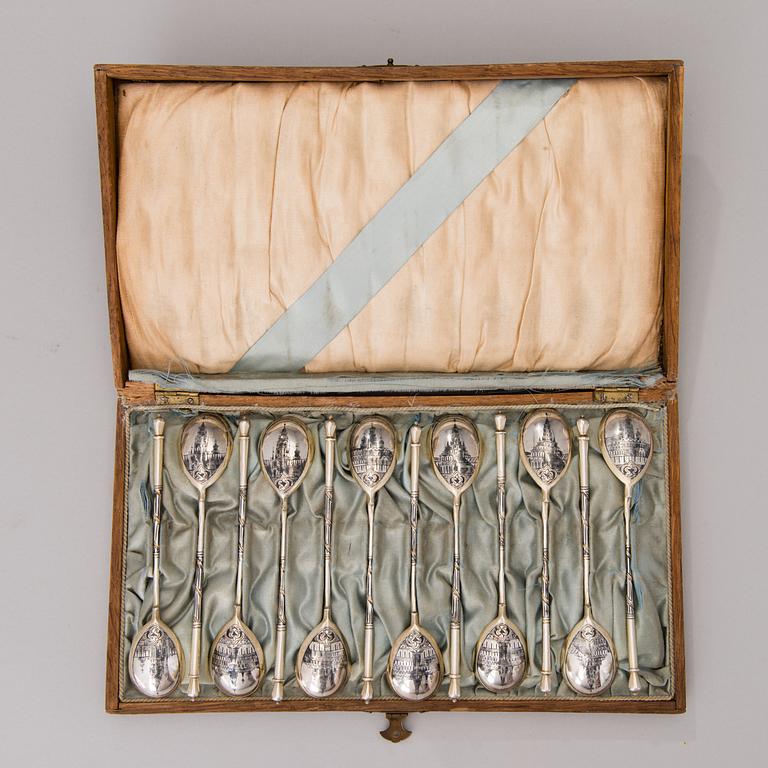 A SET OF TWELVE NIELLO TEASPOONS, silver, Stephan Levin, Moscow 1875-97.