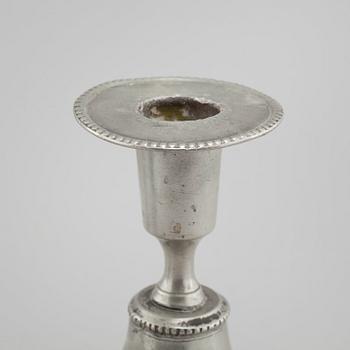 A pair of pewter candlesticks, probably by Gustaf Frederic Wigholm in Eskilstuna, first half of the 19th century.