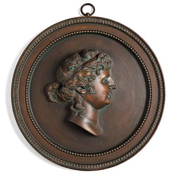 164. A mid 19th century metal medallion depicting  Anna Johanna Grill, after Sergel.