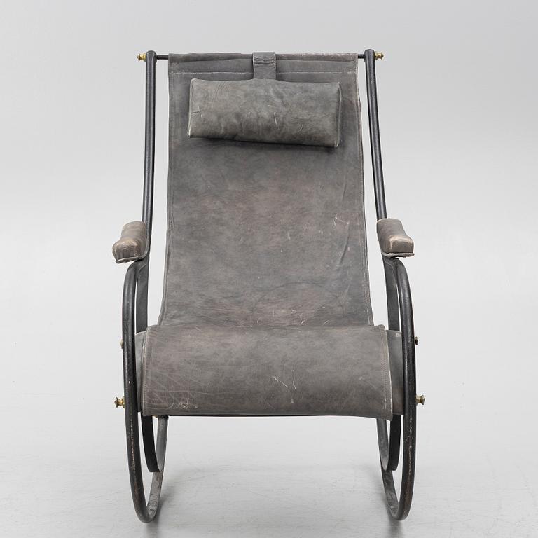 An iron rocking chair, R.W Winfeild & Company, England, late 19th century.