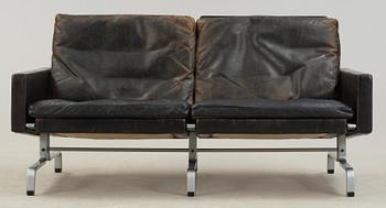 A Poul Kjaerholm 'PK-31-2' steel and black leather sofa, E Kold Christensen, Denmark.