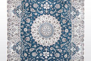 A carpet, Nain, part silk, 6 Laa, ca 312 x 208 cm.