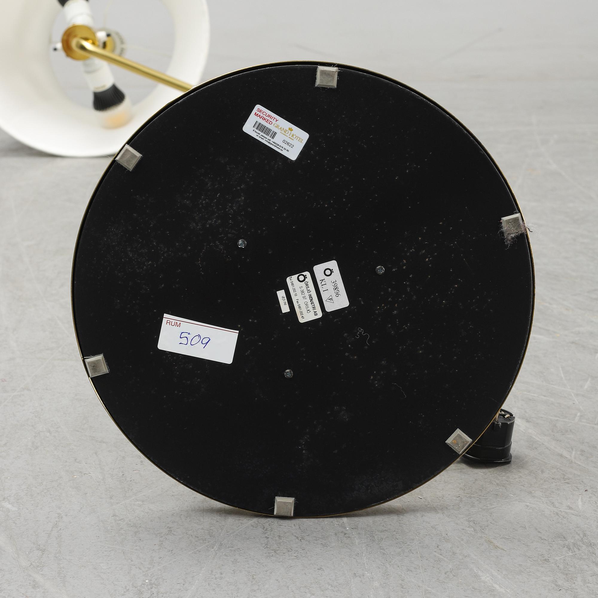 A pair of brass and leather floor lamps, Örsjö Designe, 21st century.