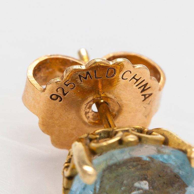 Korvakorut, 18K kultaa, topaasi ja akvamariini.