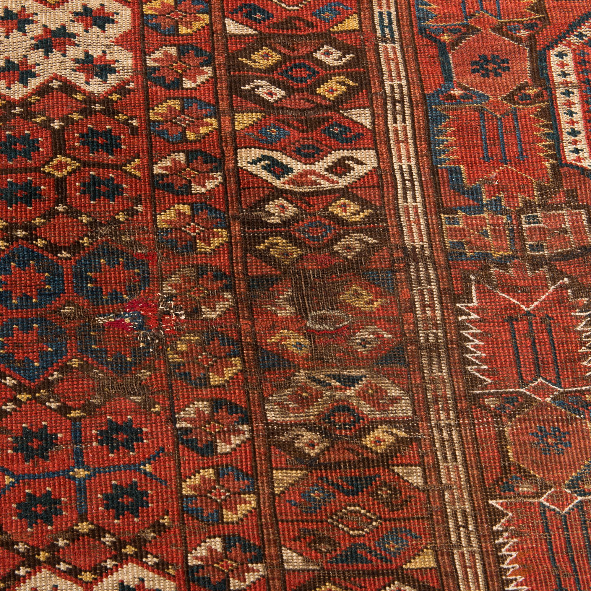 An Antique Beshir carpet, ca 183 x 390 cm.