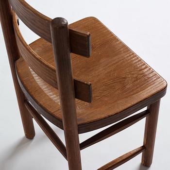 Axel Einar Hjorth, a set of four stained pine "Sandhamn" chairs, Nordiska Kompaniet, Sweden 1933.