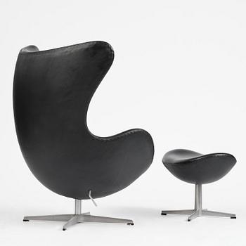 Arne Jacobsen, an "Egg" chair with ottoman, Fritz Hansen, Denmark, 2001.