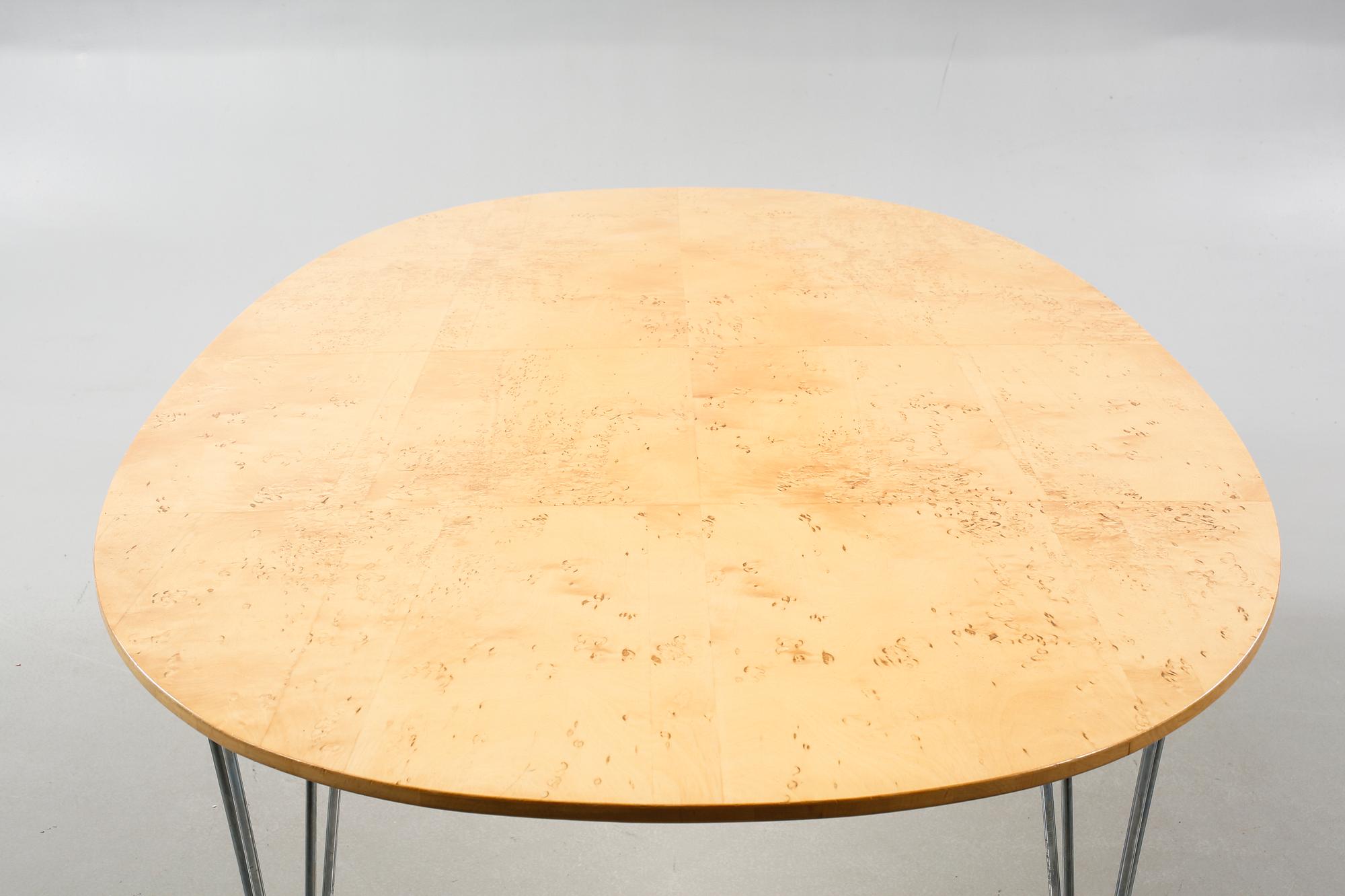 Dining table named "Superellips", designed by Piet Hein and Bruno Mathsson for Bruno Mathsson International.