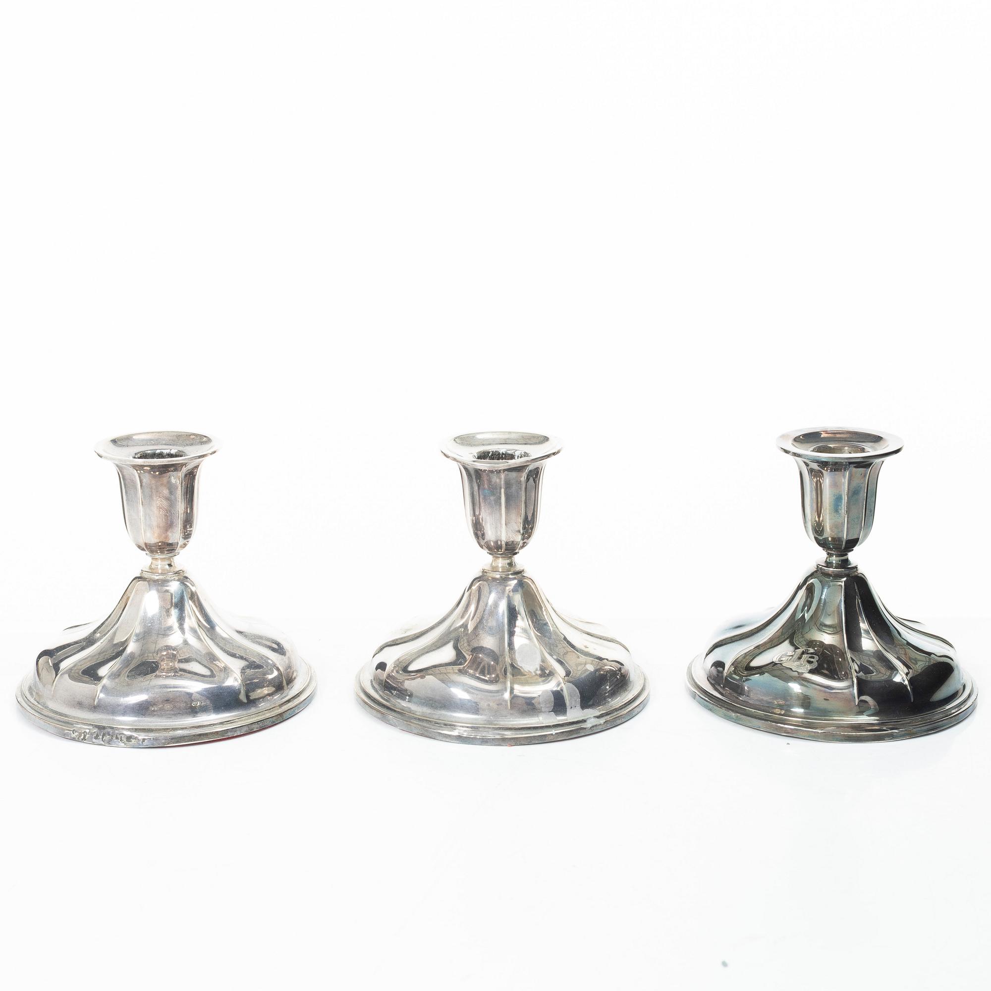 Three silver candlesticka, Norway, 20th century.