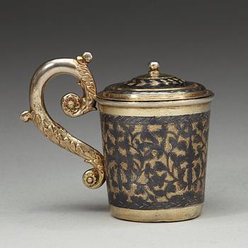 A Russian 19th century silver-gilt and niello cup and cover, unidentified makers mark, Moscow 1836.