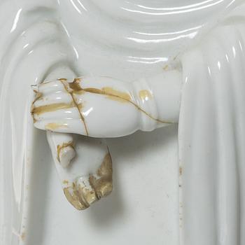A Chinese blanc-de-Chine porcelain figure of Guanyin, Qing dynasty (1644-1912.