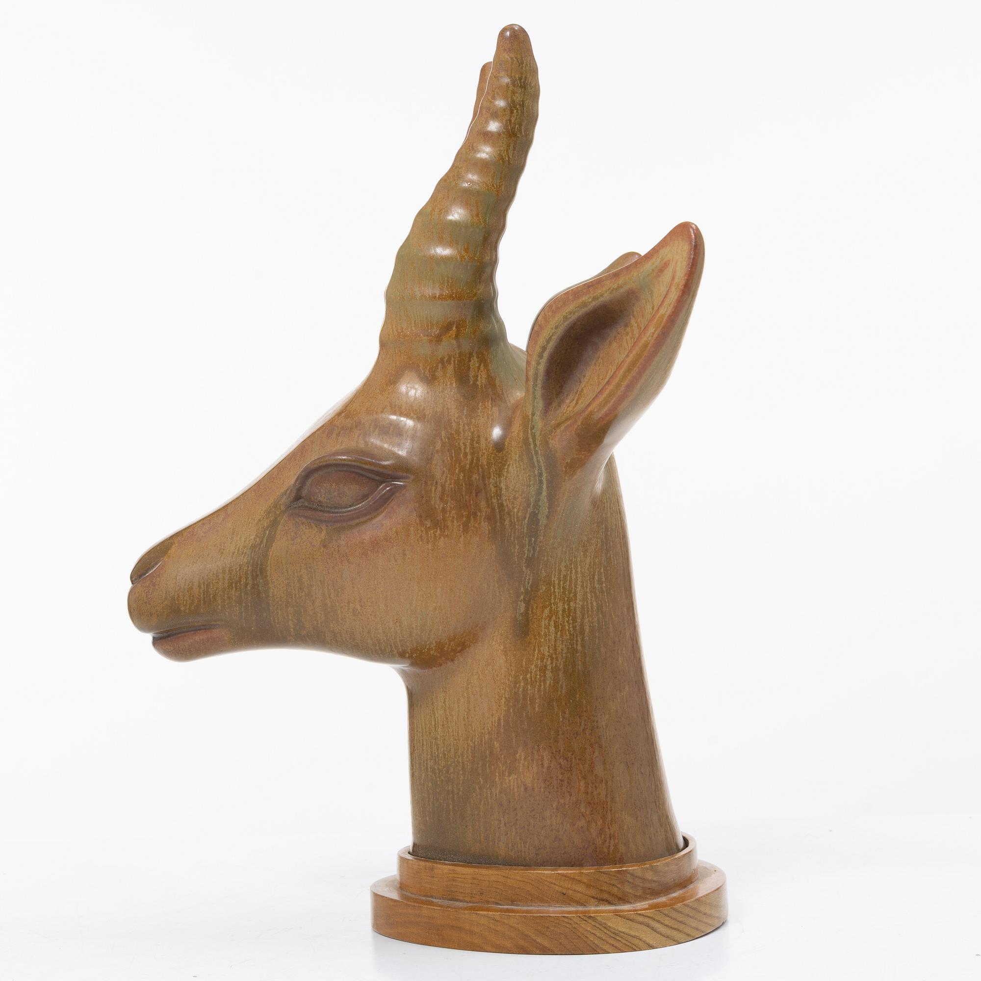 Gunnar Nylund, a stoneware figurine of an antilope head, Rörstrand, Sweden, numbered 194/200.