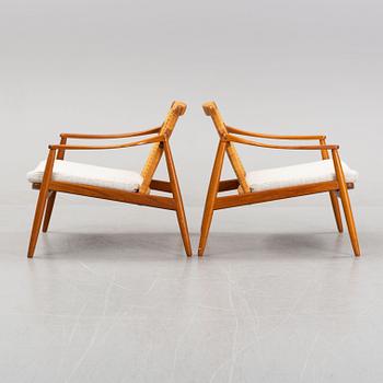Hartmuth Lohmeyer, a pair of teak and rattan easy chairs, Gemla, Diö, 1950's/60's.