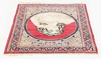 An antique pictoral Kerman Raver rug, c. 87 x 65 cm.
