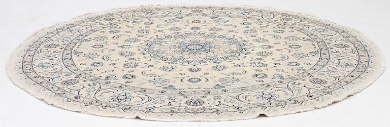 A Nain rug, diameter a. 247 cm.
