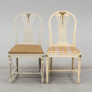 a set of 4+4 gustavian style chairs from the second half of the 20th century.