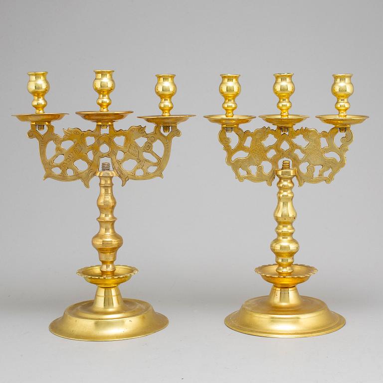 Two 19th century brass candelabra, probably Poland.