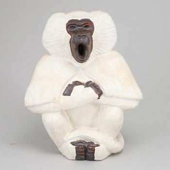 GUNNAR NYLUND, a stoneware sculpture of a monkey, Rörstrand mid 20th century.