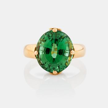 619. Sigurd Persson, A 8.19 ct green tourmaline ring. Made in, Stockholm 1945.