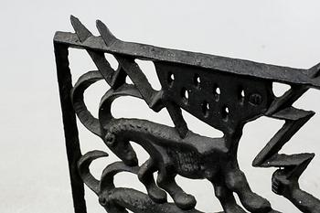 1960s cast iron spark protection by Olle Hermansson.