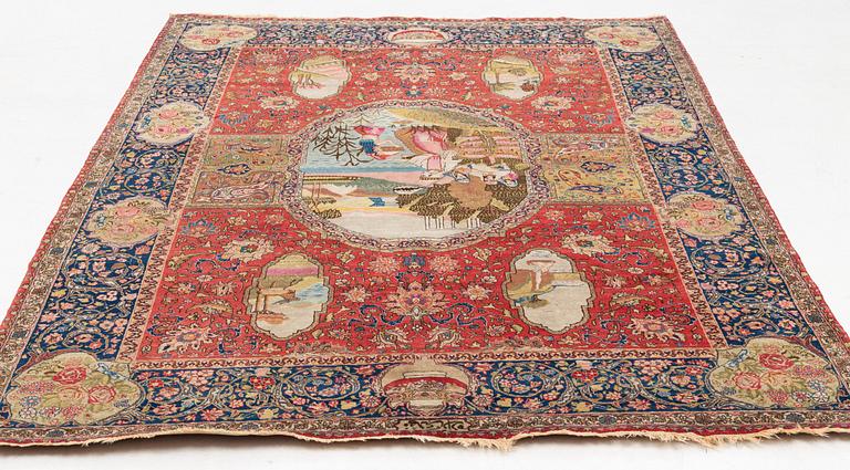 A signed semiantique pictoral Tabriz carpet, c. 269 x 189 cm.