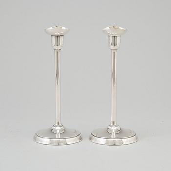 A pair of silver candlesticks by GAB, Stockholm, 1970.