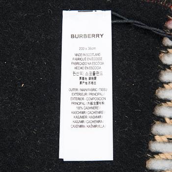 Burberry, A Icon Stripe scarf.