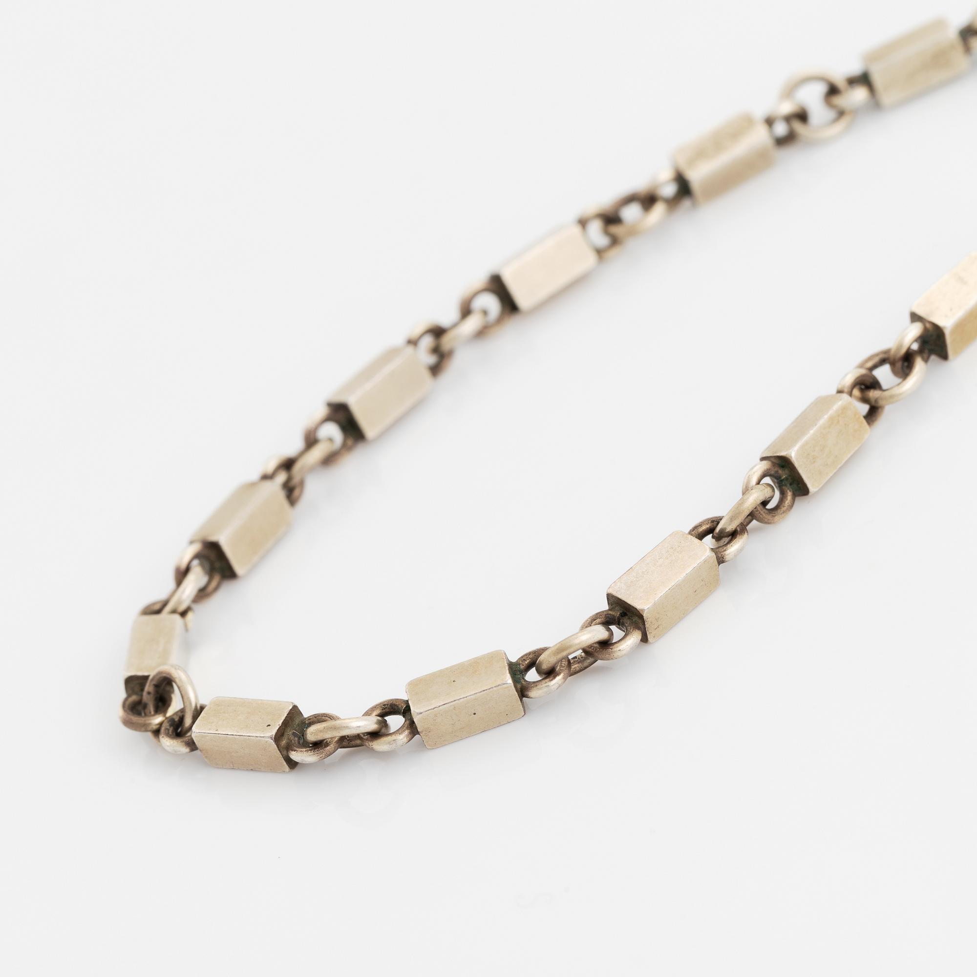 Wiwen Nilsson, collier, förgyllt silver, stavar och ringar.