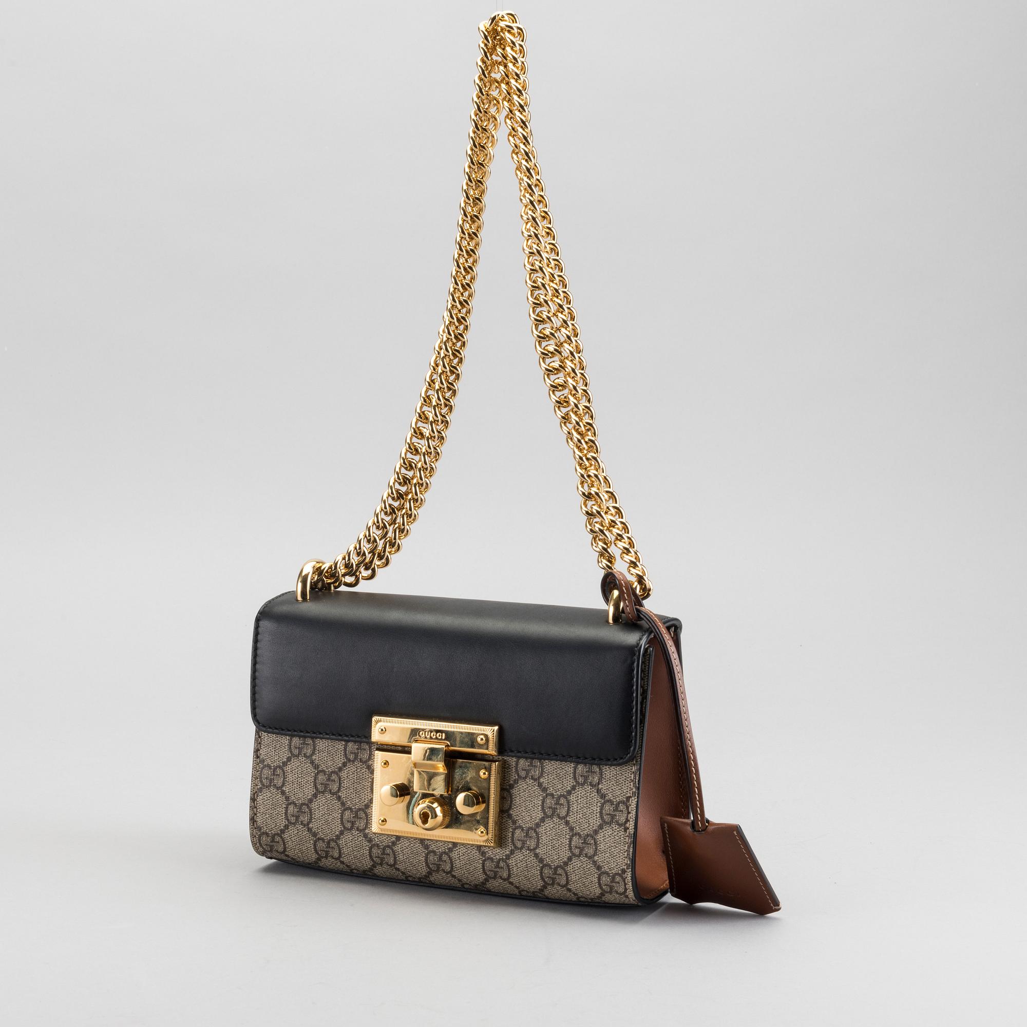 GUCCI "Padlock small GG shoulder bag".