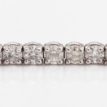 A tennis necklace/bracelet, 14K white gold and diamonds ca. 6.96 ct in total. AIG certifiacete.