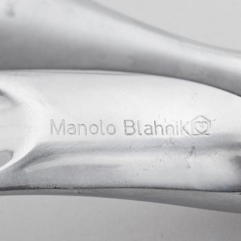 A metal shoe horn by Manolo Blahnik, 2000s.