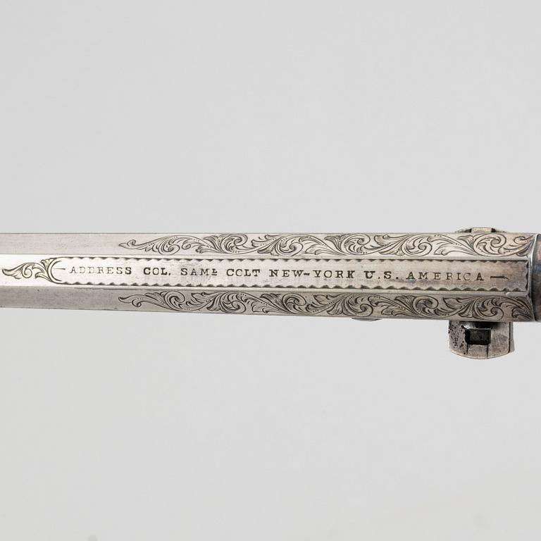 A percussion revolver, Colt 1851 Navy, in case, from the year 1863.