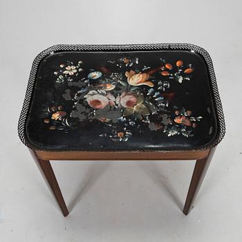 A tray table, late 19th century and first half of the 20th century.