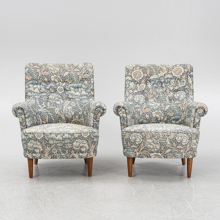 Carl Malmsten, a pair of Hemmakväll easy chairs .