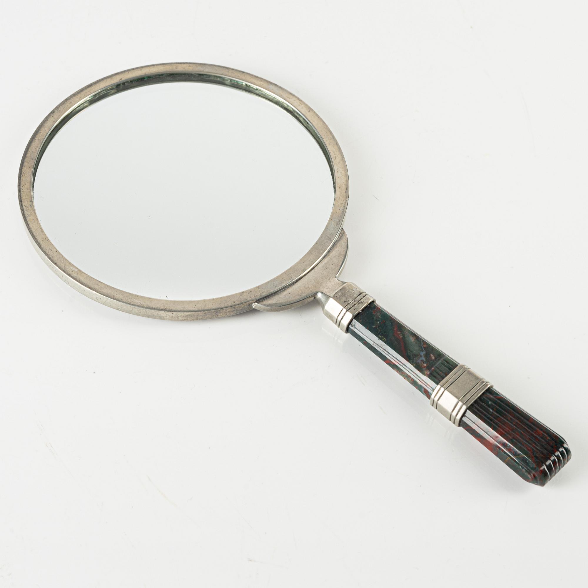 Swedish Grace, a pewter hand mirror, 1930s.