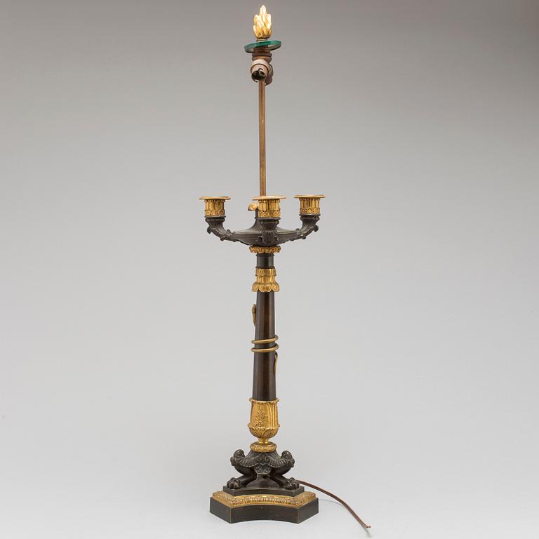 A first half of the 19th century bronze table lamp.