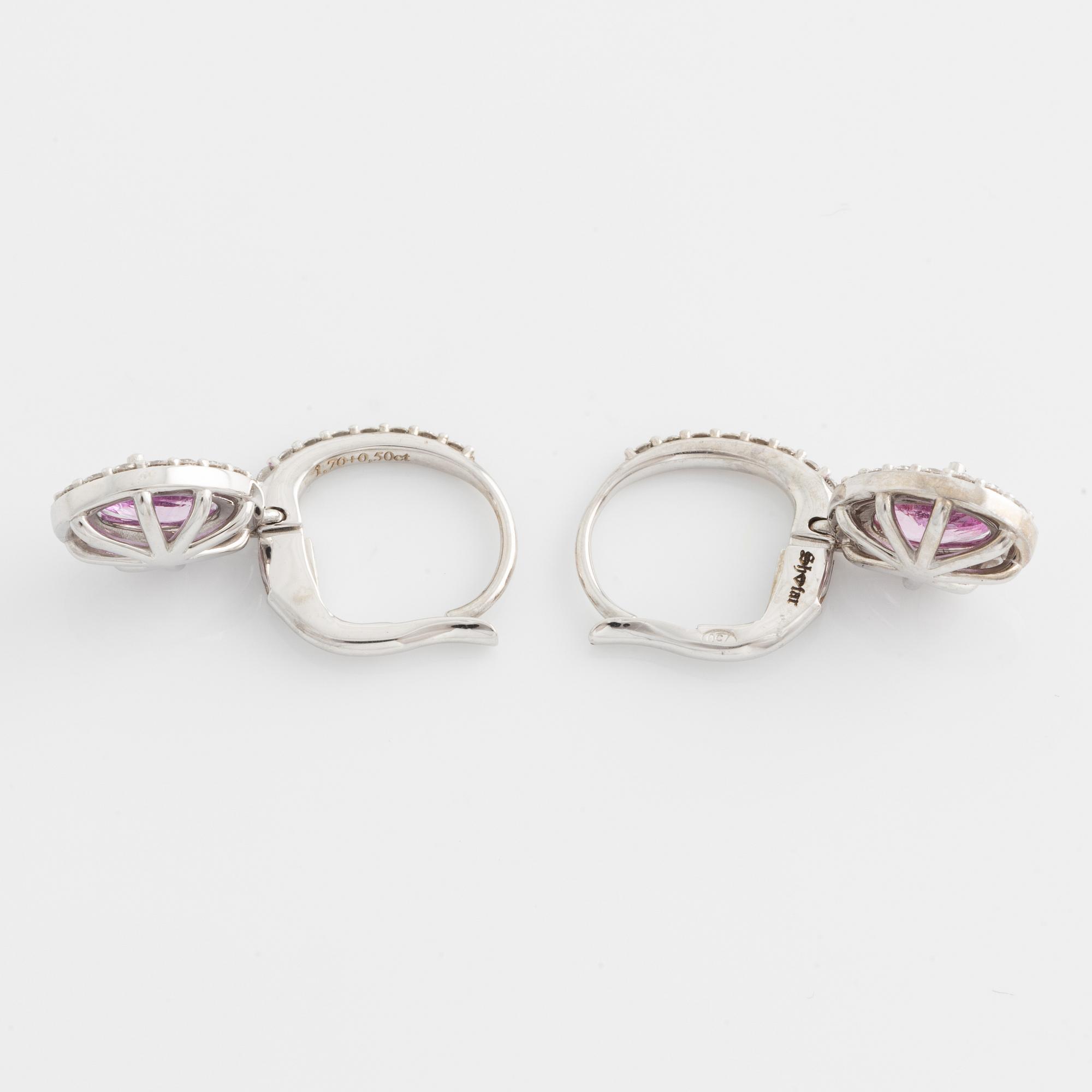 Earrings with pink sapphires and brilliant-cut diamonds.