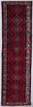 An Zageh rug, 294 x 83 cm.