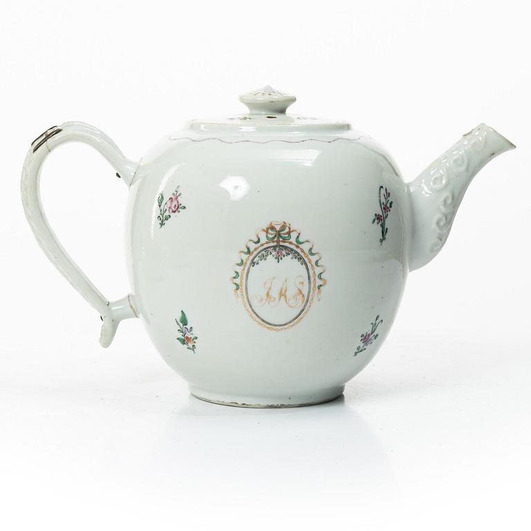 Cups and saucers, 11+7, and a teapot in famille rose with monogram, company porcelain, China, 18th century.