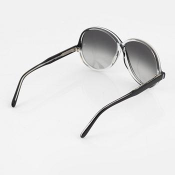 Oliver Goldsmith, a pair of "Zig Zag" sunglasses.