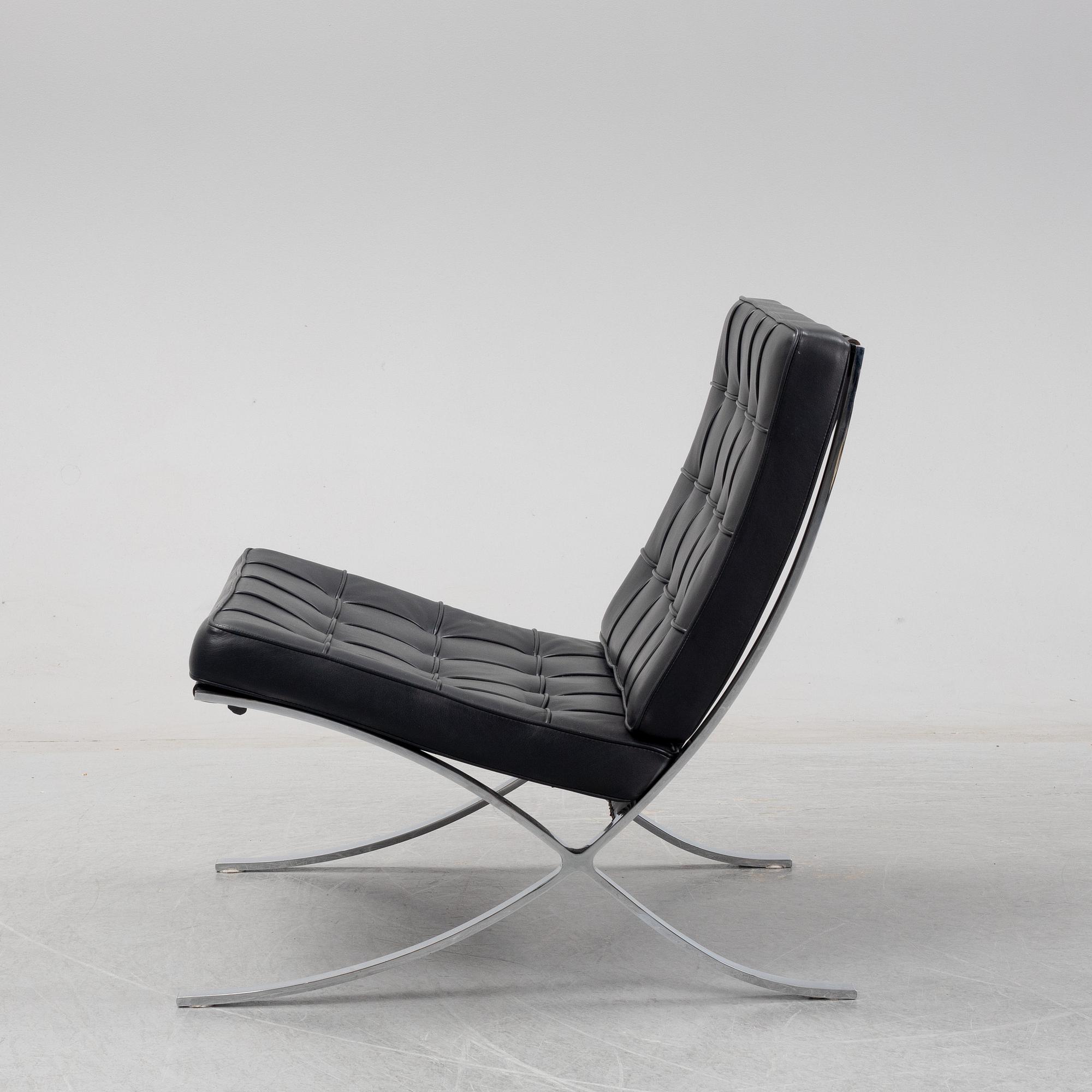 LUDWIG MIES VAN DER ROHE, a 'Barcelona' black leather lounge chair, Knoll Studio.