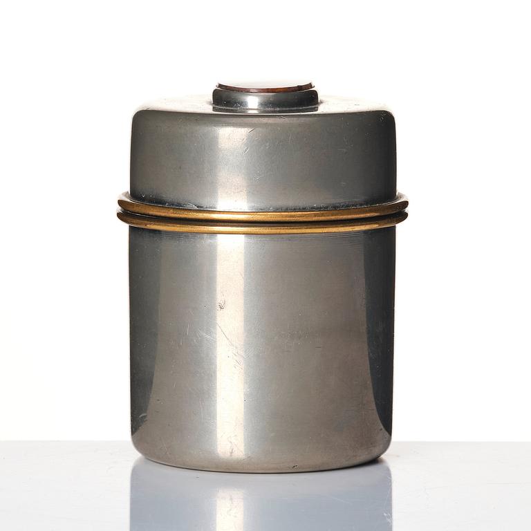 Estrid Ericson, a lidded pewter jar set with an agate model "A 1485", Firma Svenskt Tenn, Stockholm 1952.