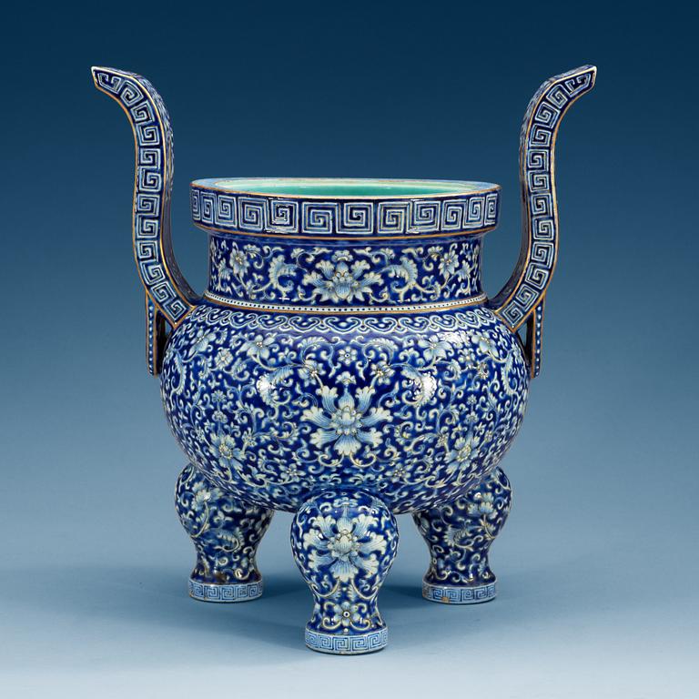 A large enamelled tripod censer, Qing dynasty.