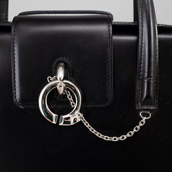 CARTIER, a bag.
